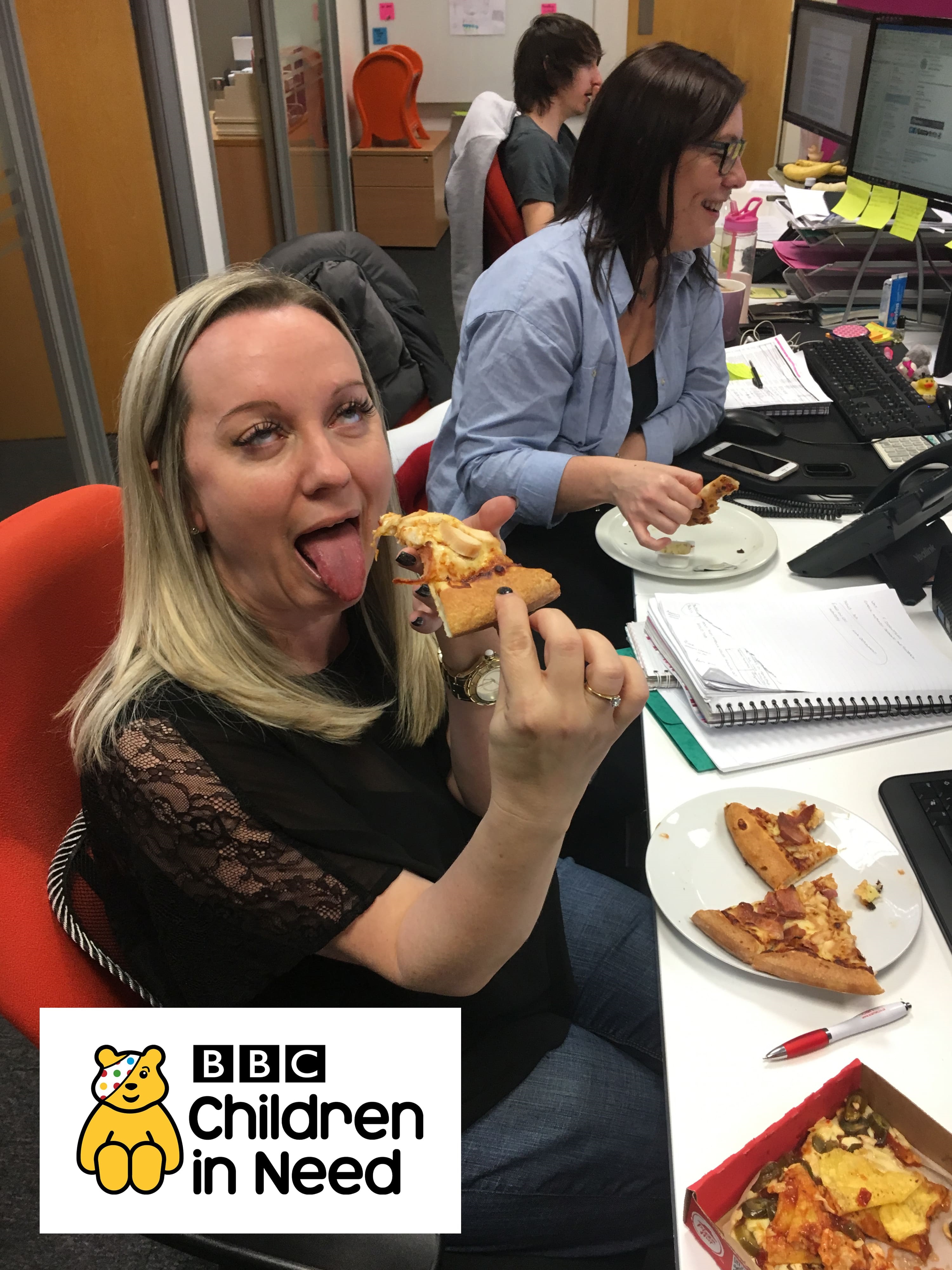 Claire eating pizza at CSI Media's Children in Need event