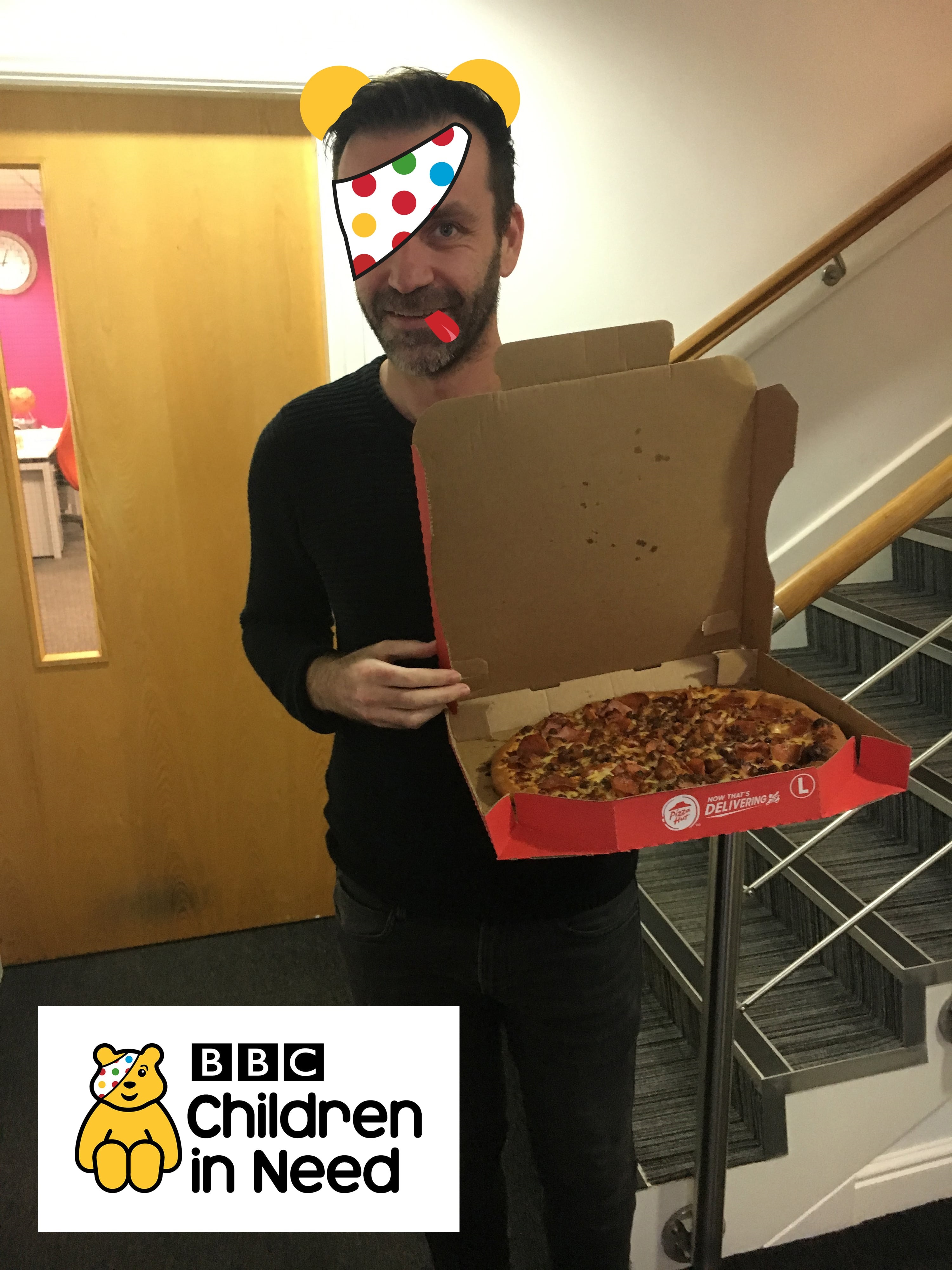 Bede delighted with his pizza at CSI Media's Children in Need event